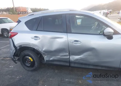 2016 Mazda Cx-5 Touring z USA, uszkodzony, nr VIN JM3KE2CY1G0675929